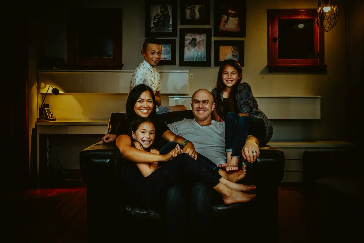 Family portrait made inside a familiar room at home