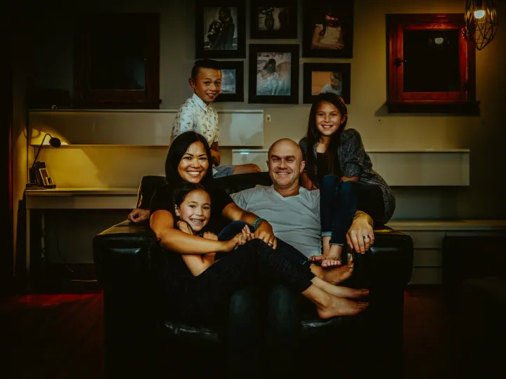 Family portrait made inside a familiar room at home