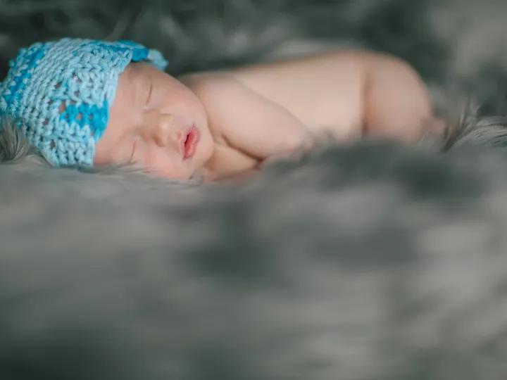 Quiet newborn photograph in soft natural light