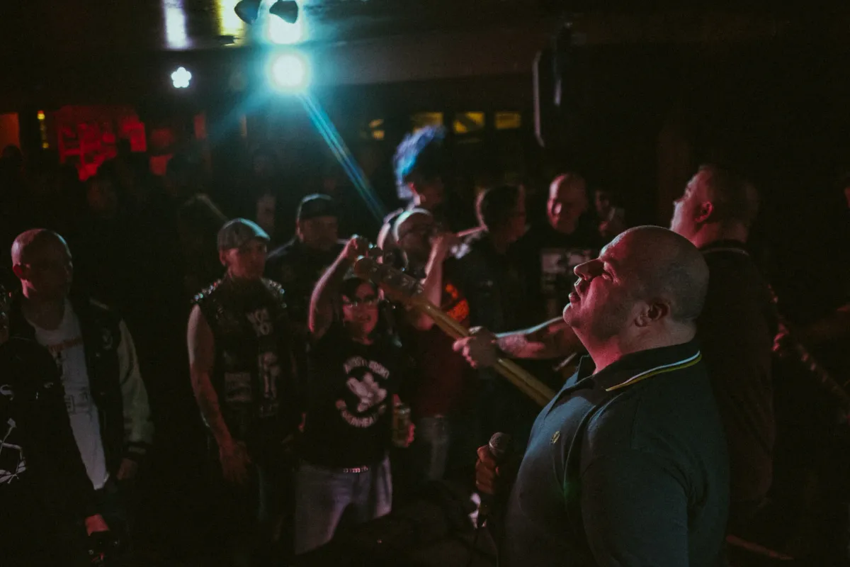 Crowd gathered close to The Borderguards during a live punk show in Calgary