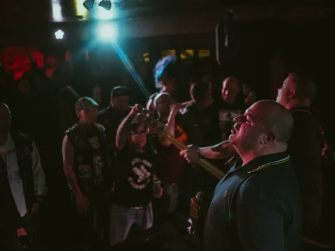 Crowd gathered close to The Borderguards during a live punk show in Calgary